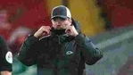Liverpool's manager Jurgen Klopp fixes his protective mask during the English Premier League soccer match between Liverpool and Brighton at Anfield stadium, in Liverpool, (AP) Liverpool's manager Jurgen Klopp fixes his protective mask during the English Premier League soccer match between Liverpool and Brighton at Anfield stadium, in Liverpool, (AP)