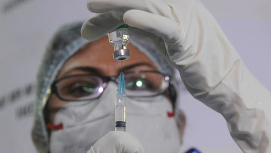 A nurse fills Covidshield dose in injection before administrating after the launch of the Covid-19 vaccination drive by Prime Minister Narendra Modi, in Kolkata on Saturday. (ANI) A nurse fills Covidshield dose in injection before administrating after the launch of the Covid-19 vaccination drive by Prime Minister Narendra Modi, in Kolkata on Saturday. (ANI)
