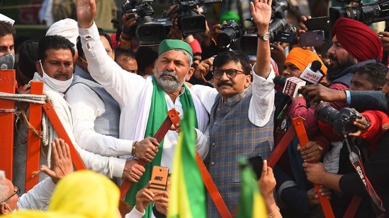 BKU leader Rakesh Tikait with Shiv Sena leader Sanjay Raut during the ongoing protest against the new farm laws. (Raj K Raj/HT PHOTO) BKU leader Rakesh Tikait with Shiv Sena leader Sanjay Raut during the ongoing protest against the new farm laws. (Raj K Raj/HT PHOTO)