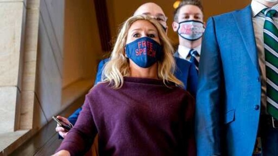 Rep. Marjorie Taylor Greene goes back to her office after speaking on the floor of the House Chamber on Capitol Hill in Washington.(AP) Rep. Marjorie Taylor Greene goes back to her office after speaking on the floor of the House Chamber on Capitol Hill in Washington.(AP)