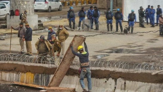 A police officer, who wished not to be named, said the metal barricades put together, between which concrete was filled, is one barrier and this will act as a second layer of protection. (Amal KS/HT Photo)