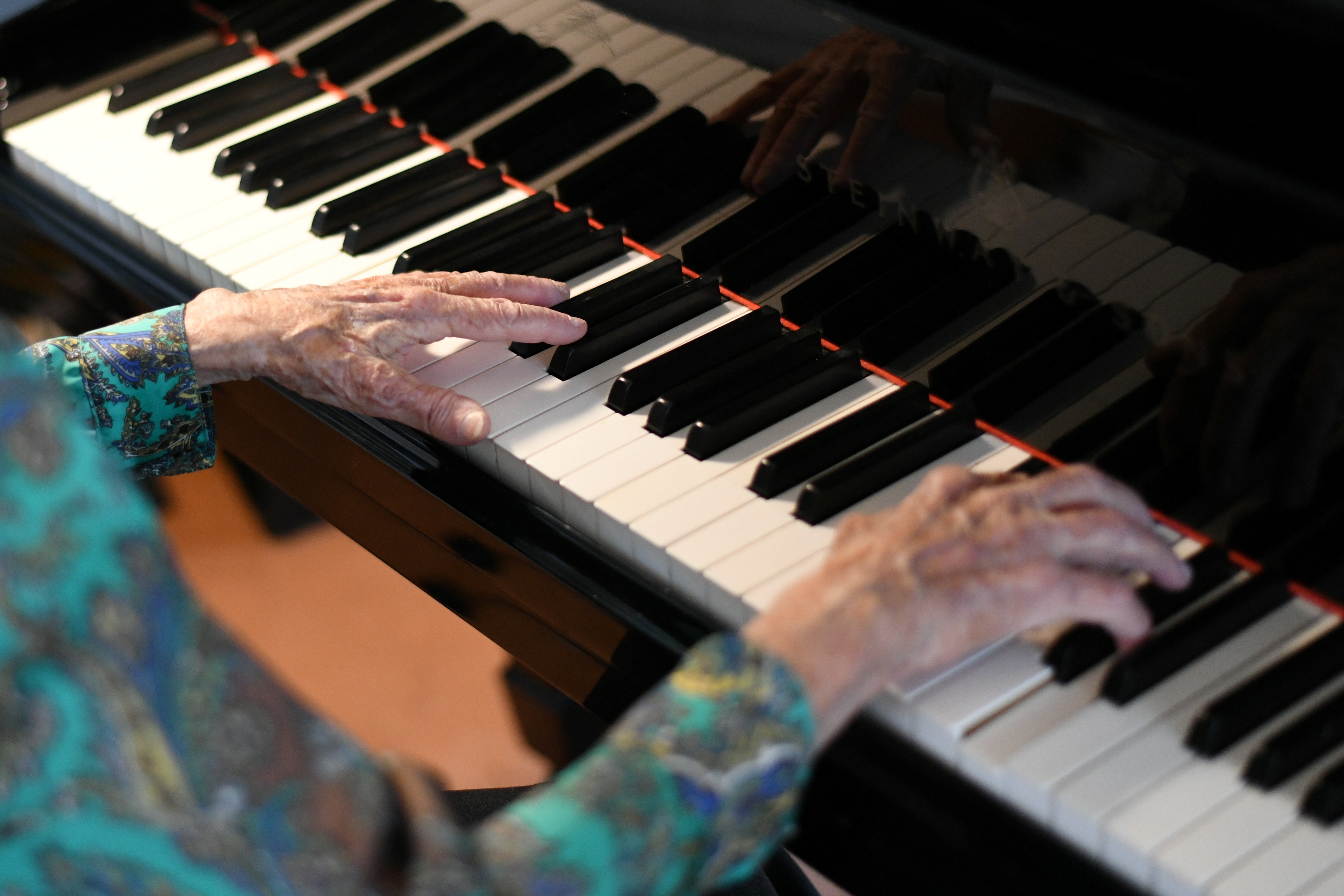 Parisian pianist Colette Maze, 106 years old, plays piano. (REUTERS)