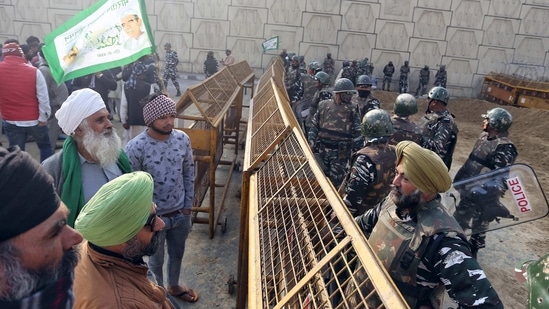 Security personnel stands guard as they on high alert during Chakka Jam by farmers against farm bills, at the Delhi-Ghazipur border in New Delhi on Saturday. (ANI Photo) Security personnel stands guard as they on high alert during Chakka Jam by farmers against farm bills, at the Delhi-Ghazipur border in New Delhi on Saturday. (ANI Photo)