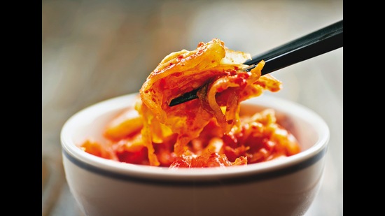 Koreans eat Kimchi, as being fermented, it benefits the digestive system Koreans eat Kimchi, as being fermented, it benefits the digestive system