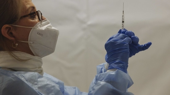 A healthcare worker prepares a dose of the Pfizer BioNTech Covid-19 vaccine at a vaccination site inside a church in the Bronx borough of New York, US, on Friday, Feb. 5, 2021. (Bloomberg File Photo) A healthcare worker prepares a dose of the Pfizer BioNTech Covid-19 vaccine at a vaccination site inside a church in the Bronx borough of New York, US, on Friday, Feb. 5, 2021.