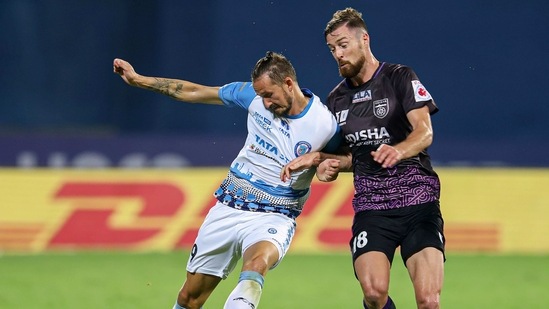 Jacob Tratt of Odisha FC and Nerijus Valskis of Jamshedpur FC in fight for the ball during their Indian Super League match at the GMC Stadium Bambolim, (PTI) Jacob Tratt of Odisha FC and Nerijus Valskis of Jamshedpur FC in fight for the ball during their Indian Super League match at the GMC Stadium Bambolim, (PTI)