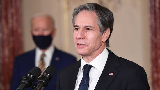 US Secretary of State Antony Blinken speaks to staff at the US state department during the first visit of US President Joe Biden (left) in Washington, DC, on February 4, 2021. (AFP)