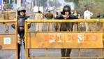 Security tightened during an ongoing farmer's protest against the new farm laws, at the Singhu border in New Delhi on Thursday. (ANI Photo) Security tightened during an ongoing farmer's protest against the new farm laws, at the Singhu border in New Delhi on Thursday. (ANI Photo)