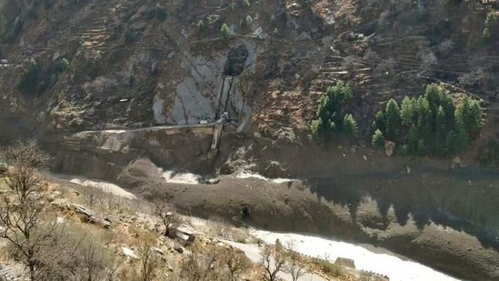 A view of damaged dam after a glacier broke and crashed into the dam at Raini Chak Lata village in Chamoli district in Uttarakhand, on Sunday (REUTERS)
