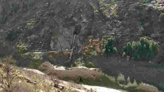 A view of damaged dam after a glacier broke and crashed into the dam at Raini Chak Lata village in Chamoli district in Uttarakhand, on Sunday(REUTERS)