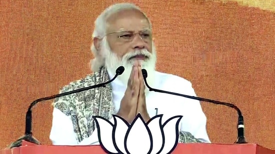 Prime Minister Narendra Modi greets a gathering before his address, in Haldia on Sunday.(ANI Photo) Prime Minister Narendra Modi greets a gathering before his address, in Haldia on Sunday.(ANI Photo)