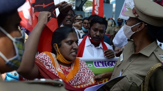 Protesters shouting slogans at a roadblock in Chennai on February 6. The Congress and Left parties, too, held protests in some states in support of the “chakka jam” called by the farmer unions.(Arun Sankar / AFP)