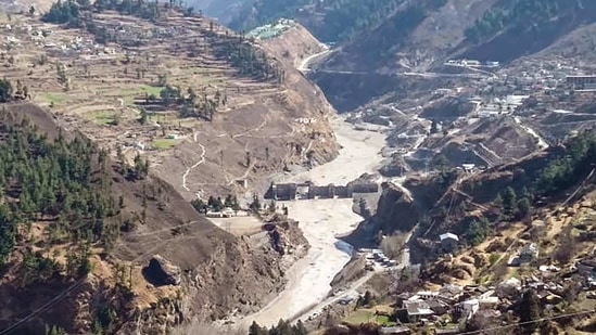 The damaged dam of the Rishi Ganga Power Project is seen after a glacier broke off in Joshimath in Uttarakhand's Chamoli district causing a massive flood in the Dhauli Ganga river on Sunday,(PTI)