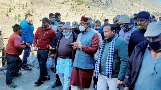 Uttarakhand chief minister Trivendra Singh Rawat inspects flood-hit areas after a glacier broke off in Joshimath in Uttarakhand’s Chamoli district causing a massive flood in the Dhauli Ganga river.(PTI)