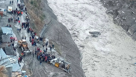 Rescue operations underway near the flash flood site in Uttarakhand, in Chamoli district on Sunday.(PTI)