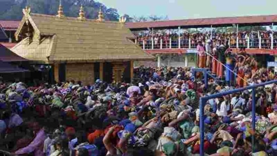 Two women in their forties had trekked the hill shrine a day after the human wall was erected and offered prayers, breaking the age-old custom of not allowing those in the menstrual age to pray at the Ayyappa temple.(AP)