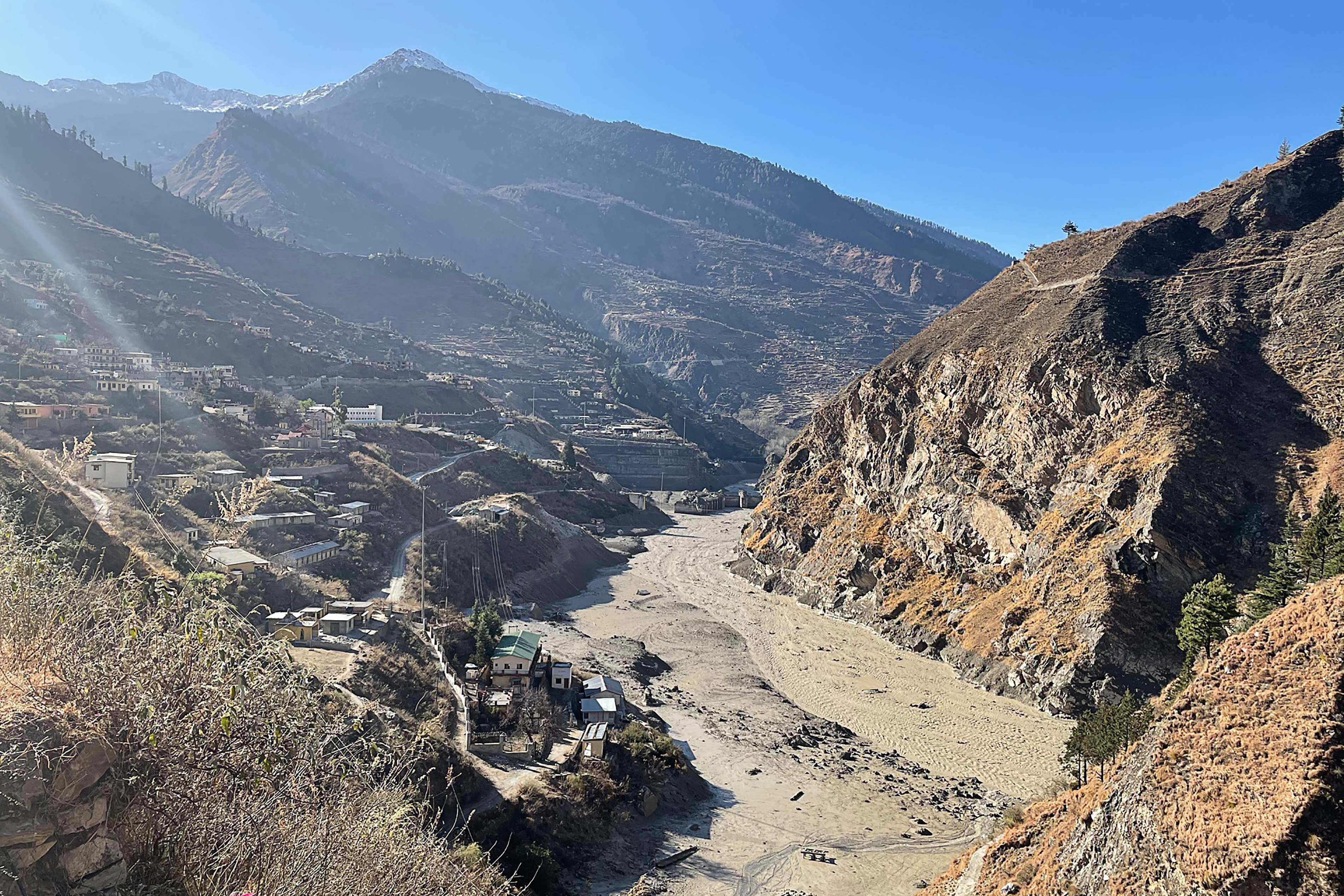 This general view shows state-run NTPC hydropower project site damaged after a broken glacier caused a major river surge that swept away bridges and roads, near Joshimath in Chamoli district of Uttarakhand. (AFP) This general view shows state-run NTPC hydropower project site damaged after a broken glacier caused a major river surge that swept away bridges and roads, near Joshimath in Chamoli district of Uttarakhand. (AFP)