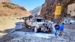 People inspect the site near the damaged Dhauliganga hydropower project at Reni village in Chamoli district after a portion of Nanda Devi glacier broke off in Tapovan area of Uttarakhand. (AP) People inspect the site near the damaged Dhauliganga hydropower project at Reni village in Chamoli district after a portion of Nanda Devi glacier broke off in Tapovan area of Uttarakhand. (AP)