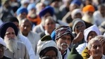 Farmers participate in a demonstration against recent agricultural reforms at a highway in Ghazipur on the outskirts of New Delhi, India,(Bloomberg) Farmers participate in a demonstration against recent agricultural reforms at a highway in Ghazipur on the outskirts of New Delhi, India,(Bloomberg)