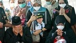 Relatives weep as they pray during the burial of Fadly Satrianto, a victim of the crash of Sriwijaya Air flight SJ-182 in Surabaya, East Java, Indonesia. (AP) Relatives weep as they pray during the burial of Fadly Satrianto, a victim of the crash of Sriwijaya Air flight SJ-182 in Surabaya, East Java, Indonesia. (AP)