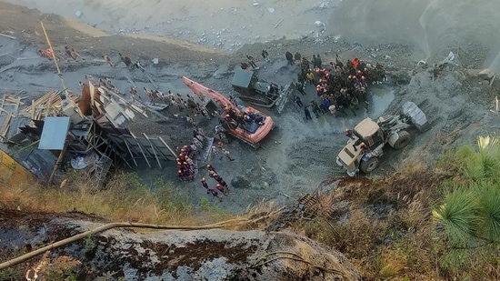 Rescue team members work near a tunnel after a part of a glacier broke away and caused flood in Tapovan, in Uttarakhand.(Reuters Photo)