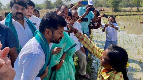 On Monday morning, Reddy continued his walk for a distance of nearly 25 km up to Chintapalli. Along the route, he went into the fields and interacted with farmers on the roadside to understand their problems. (HT PHOTO). On Monday morning, Reddy continued his walk for a distance of nearly 25 km up to Chintapalli. Along the route, he went into the fields and interacted with farmers on the roadside to understand their problems. (HT PHOTO).