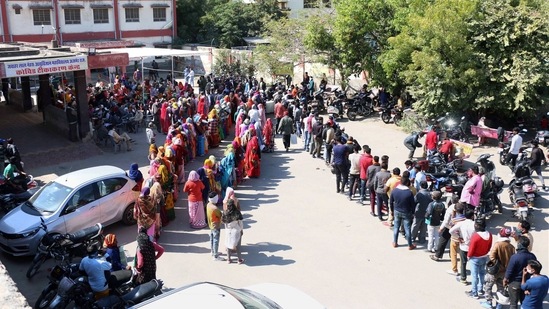 Ajmer: Ajmer Municipal Corporation workers stand in a queue to be vaccinated, during an inoculation drive against COVID-19, in Ajmer. (PTI) Ajmer: Ajmer Municipal Corporation workers stand in a queue to be vaccinated, during an inoculation drive against COVID-19, in Ajmer. (PTI)