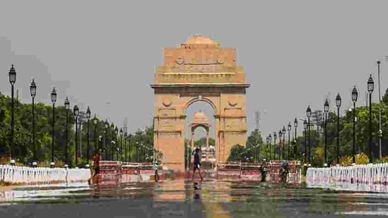A mirage seen along Rajpath, as the temperature soared in New Delhi on May 24. The red category alert was issued for severe heatwave conditions on May 25 and 26. (Amal KS / HT Photo) A mirage seen along Rajpath, as the temperature soared in New Delhi on May 24. The red category alert was issued for severe heatwave conditions on May 25 and 26. (Amal KS / HT Photo)