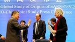 Marion Koopmans, right, and Peter Ben Embarek, centre, of the WHO team, say farewell to their Chinese counterpart Liang Wannian, left, after a WHO-China Joint Study Press Conference.(AP) Marion Koopmans, right, and Peter Ben Embarek, centre, of the WHO team, say farewell to their Chinese counterpart Liang Wannian, left, after a WHO-China Joint Study Press Conference.(AP)