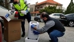 Members of Lebanese NGO Baytna Baytak Firas Minnawi, right, and Mario Suleiman, left, unpack oxygen machine to be donated to an elderly COVID-19 patient in Beit Shebab, a mountain village 15 mile (24 km) north of Beirut, Lebanon, Wednesday, Jan. 27, 2021. The group of Lebanese activists are matching empty apartments and hotel rooms with nurses and doctors who are serving countless hours in the country's hospitals overwhelmed with COVID patients and who need a place to rest without endangering their families or elderly parents. (AP Photo/Bilal Hussein)(AP) Members of Lebanese NGO Baytna Baytak Firas Minnawi, right, and Mario Suleiman, left, unpack oxygen machine to be donated to an elderly COVID-19 patient in Beit Shebab, a mountain village 15 mile (24 km) north of Beirut, Lebanon, Wednesday, Jan. 27, 2021. The group of Lebanese activists are matching empty apartments and hotel rooms with nurses and doctors who are serving countless hours in the country's hospitals overwhelmed with COVID patients and who need a place to rest without endangering their families or elderly parents. (AP Photo/Bilal Hussein)(AP)