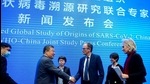 Peter Ben Embarek, a member of the World Health Organization team tasked with investigating the origins of the coronavirus disease, shakes hands with Liang Wannian, head of expert panel on Covid-19 response at China's National Health Commission in Wuhan on February 9. (REUTERS) Peter Ben Embarek, a member of the World Health Organization team tasked with investigating the origins of the coronavirus disease, shakes hands with Liang Wannian, head of expert panel on Covid-19 response at China's National Health Commission in Wuhan on February 9. (REUTERS)
