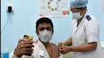 A frontline worker takes a selfie while being vaccinated against Covid-19 at Rajawadi Hospital. (Satish Bate/HT Photo) A frontline worker takes a selfie while being vaccinated against Covid-19 at Rajawadi Hospital. (Satish Bate/HT Photo)