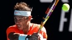 Melbourne: Spain's Rafael Nadal makes a backhand return to Serbia's Laslo Djere during their first round match at the Australian Open tennis championship in Melbourne, Australia, Tuesday, Feb. 9, 2021. (AP) Melbourne: Spain's Rafael Nadal makes a backhand return to Serbia's Laslo Djere during their first round match at the Australian Open tennis championship in Melbourne, Australia, Tuesday, Feb. 9, 2021. (AP)