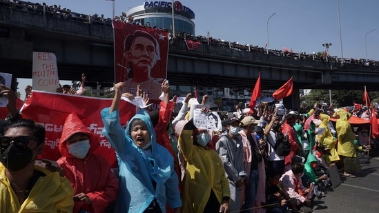 Protesters take part in a demonstration demanding the release of Aung San Suu Kyi in Yangon on February 9. The February 1 coup and detention of elected civilian leader Aung San Suu Kyi has brought the largest demonstrations in more than a decade and a growing civil disobedience movement affecting hospitals, schools and government offices.(Sai Aung Main / AFP)