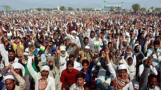 Farmers shout slogans during the 'Kisan Mahapanchayat' at Sunhera village, in Gurugram. (ANI Photo) Farmers shout slogans during the 'Kisan Mahapanchayat' at Sunhera village, in Gurugram. (ANI Photo)