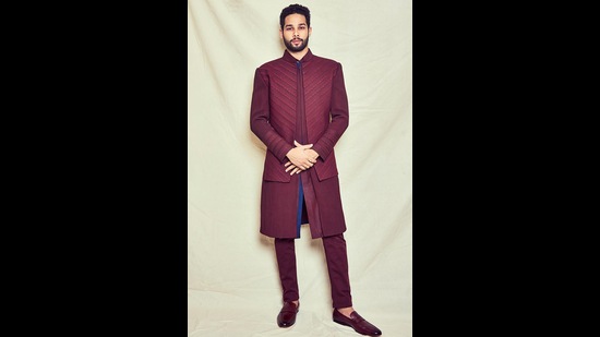 Siddhant Chaturvedi in a wine toned ensemble (Photo: Instagram/KunalAnilTanna) Siddhant Chaturvedi in a wine toned ensemble (Photo: Instagram/KunalAnilTanna)