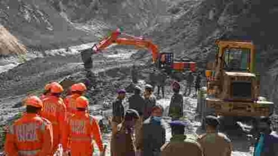 NDRF personnel clear debris in Tapovan, in Uttarakhand on Tuesday.(AP Photo) NDRF personnel clear debris in Tapovan, in Uttarakhand on Tuesday.(AP Photo)