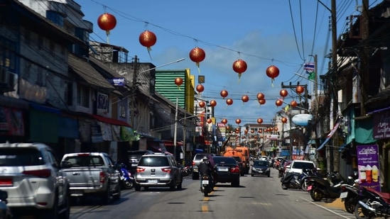 Lanterns are strung over a road ahead of the Lunar New Year festival in Thailand's southern province of Narathiwat on February 8, 2021. (Photo by Madaree TOHLALA / AFP)(AFP)