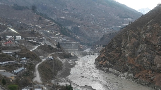 A general view shows the remains of a dam (centre) along a river in Tapovan of Chamoli district on February 8, 2021 destroyed after a flash flood thought to have been caused when a glacier burst on February 7. (Photo by Sajjad HUSSAIN / AFP)(AFP)