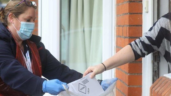 Attention is turning to the U.K.’s 22 billion-pound ($30 billion) test and trace system as infections continue to fall across the country as a result of the third national lockdown. (Bloomberg Photo) Attention is turning to the U.K.’s 22 billion-pound ($30 billion) test and trace system as infections continue to fall across the country as a result of the third national lockdown. (Bloomberg Photo)