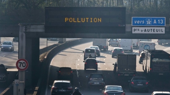 Vehicles drive on Paris ring during a pollution spike. (AP File Photo) Vehicles drive on Paris ring during a pollution spike. (AP File Photo)