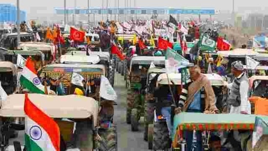 Farmers participate in a tractor rally to protest against the newly passed farm bills in New Delhi (REUTERS)