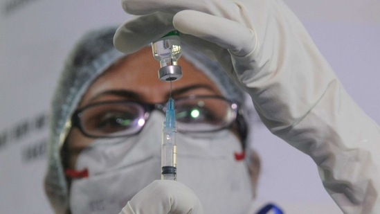 A nurse fills Covidshield dose in injection before administrating after the launch of the COVID-19 vaccination drive by Prime Minister Narendra Modi, in Kolkata. (ANI) A nurse fills Covidshield dose in injection before administrating after the launch of the COVID-19 vaccination drive by Prime Minister Narendra Modi, in Kolkata. (ANI)