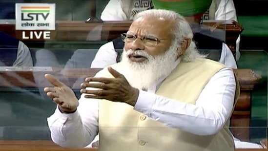 Prime Minister Narendra Modi replies in Lok Sabha to the Motion of Thanks on the President's Address during the Budget Session of Parliament in New Delhi on Wednesday. (ANI Photo/ LSTV)