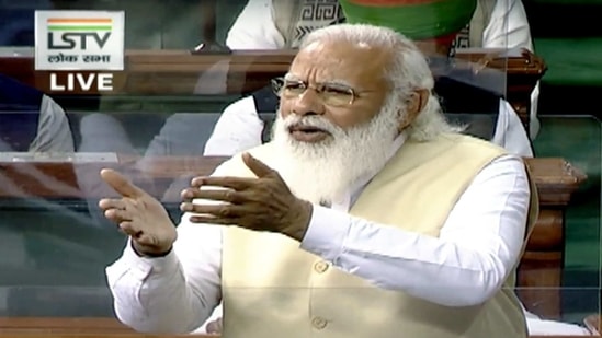 Prime Minister Narendra Modi replies in Lok Sabha to the Motion of Thanks on the President's Address during the Budget Session of Parliament in New Delhi on Wednesday. (ANI Photo/ LSTV)