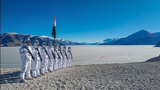Indo Tibetan Border Police personnel near the bank of Pangong lake, in Ladakh. (PTI file)