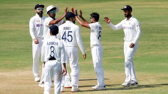 India's Ravichandran Ashwin celebrates with teammates after taking a wicket during the 4th day of first cricket test match between India and England, at M.A. Chidambaram Stadium ,in Chennai(PTI)