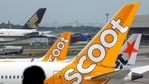 Scoot, Jetstar and Singapore Airlines planes sit on the tarmac at Singapore's Changi Airport, Singapore January 18, 2021. REUTERS/Edgar Su(REUTERS)