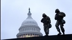 Members of the National Guard walk past the US Capitol building in Washington, DC on February 11. (Bloomberg) Members of the National Guard walk past the US Capitol building in Washington, DC on February 11. (Bloomberg)