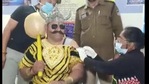 Police constable Jawahar Singh, dressed in black with golden headgear, spread the message that people should not fear the COVID-19.(ANI) Police constable Jawahar Singh, dressed in black with golden headgear, spread the message that people should not fear the COVID-19.(ANI)